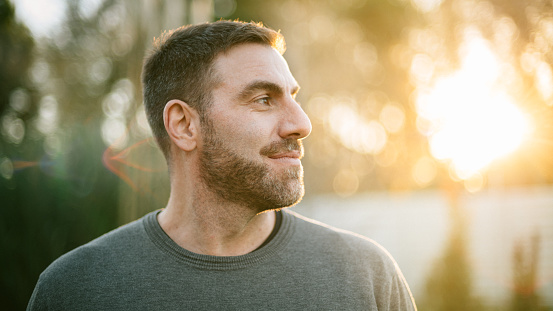 Middle age man portrait at sunset